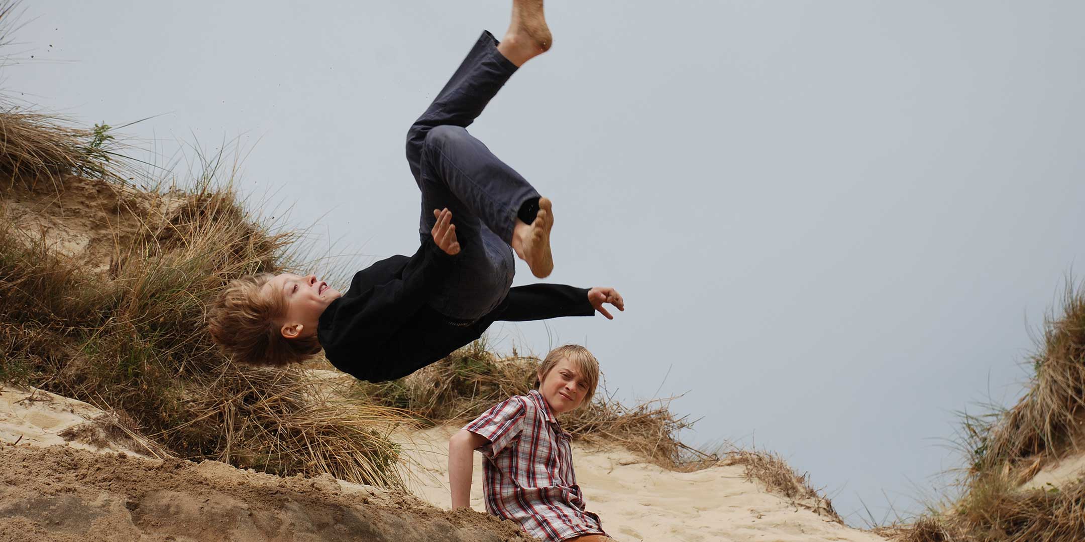 Little Blue House jumping in the dunes